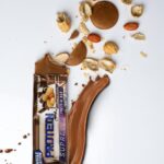 پروتئین‌ بار ماسل استیشن Muscle Station طعم بادام زمینی شکلات تکه ای