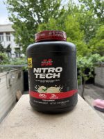 پروتئین وی وانیلی ماسل تک NITRO TECH  حاوی کراتین مونوهیدرات